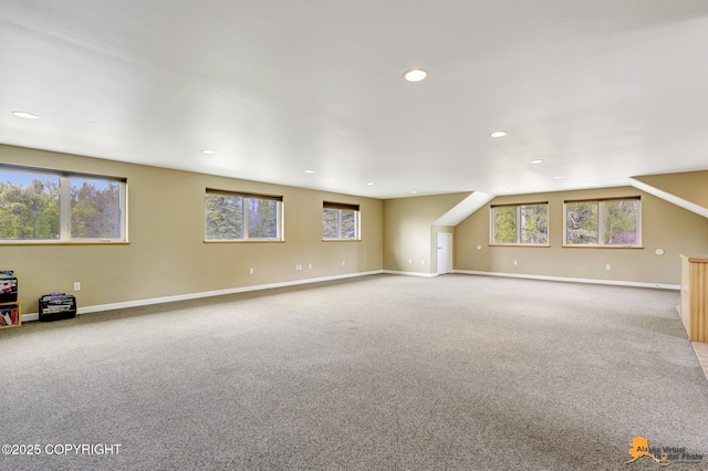 below grade area featuring carpet, baseboards, and recessed lighting