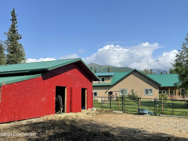 3577 N Clark Wolverine Rd, Palmer, AK 99645 - horse barn with a mountain view