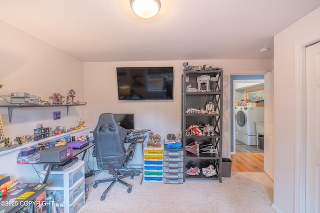 home office with washing machine and dryer and carpet floors