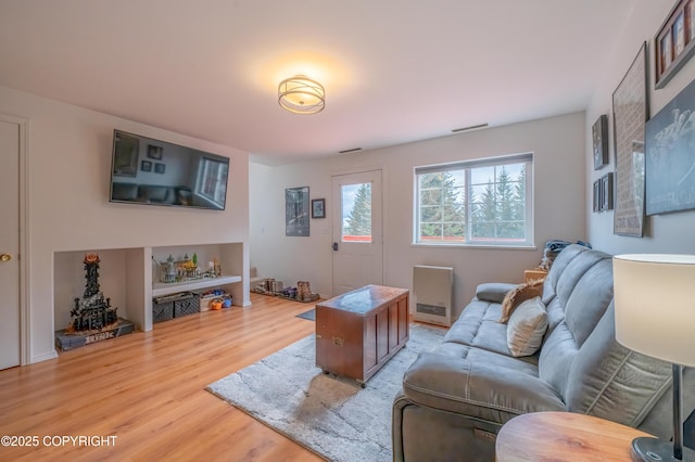 living area with wood finished floors