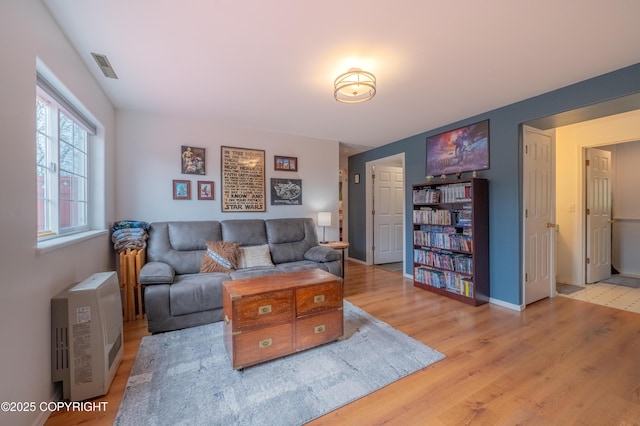 living room with wood finished floors