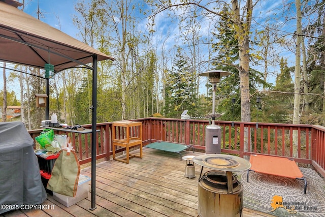 wooden terrace with grilling area