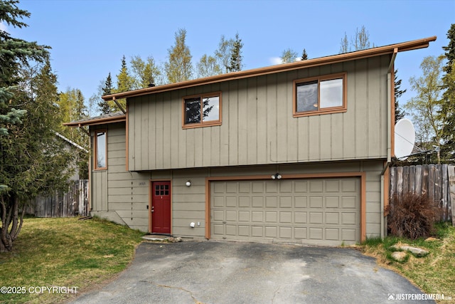 view of front of home featuring a garage and driveway