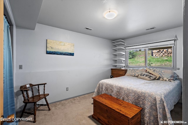 carpeted bedroom with baseboards