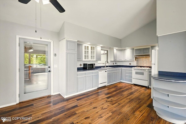 4035 S Tustin Dr, Palmer, AK 99645 - kitchen featuring white appliances, a ceiling fan, decorative backsplash, dark wood-style floors, and lofted ceiling
