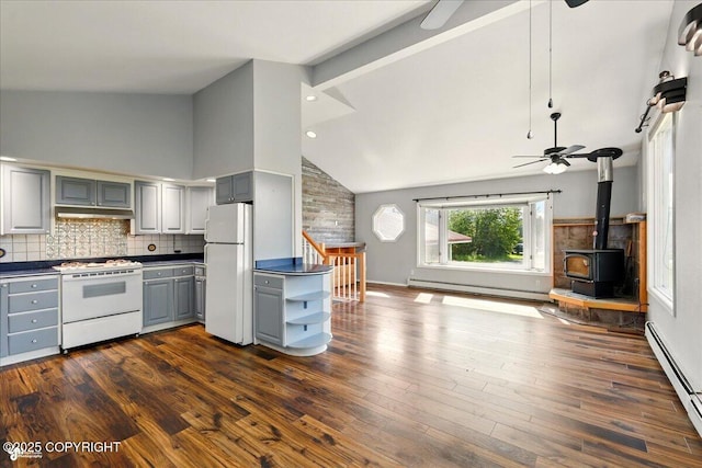 4035 S Tustin Dr, Palmer, AK 99645 - kitchen featuring gray cabinetry, white appliances, open floor plan, dark countertops, and a baseboard heating unit