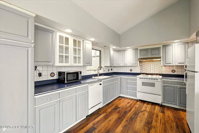 4035 S Tustin Dr, Palmer, AK 99645 - kitchen featuring white appliances, gray cabinets, a sink, dark countertops, and tasteful backsplash
