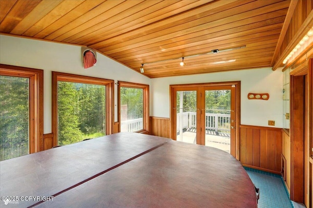 4035 S Tustin Dr, Palmer, AK 99645 - unfurnished dining area featuring wooden ceiling, wainscoting, healthy amount of natural light, wooden walls, and french doors