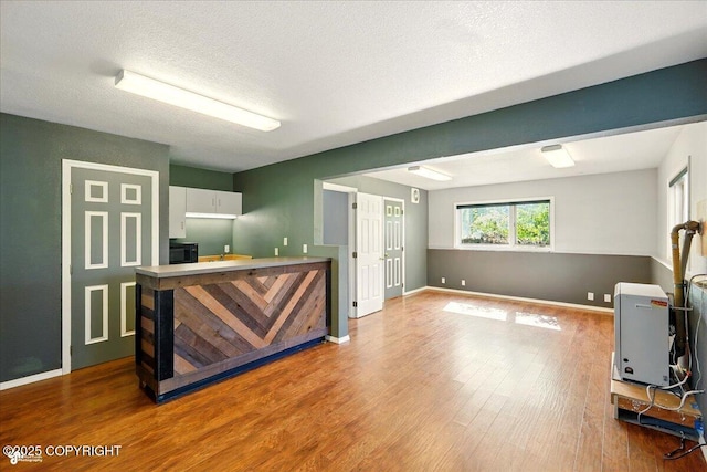 4035 S Tustin Dr, Palmer, AK 99645 - bar area featuring wood finished floors and baseboards