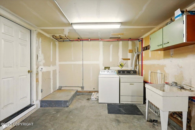 4035 S Tustin Dr, Palmer, AK 99645 - washroom featuring separate washer and dryer and cabinet space