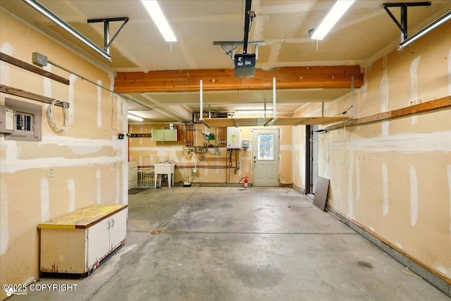 4035 S Tustin Dr, Palmer, AK 99645 - garage with water heater, a garage door opener, electric panel, and a sink