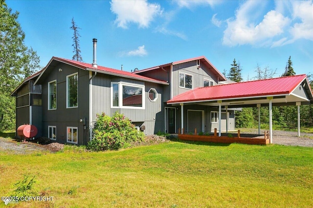 4035 S Tustin Dr, Palmer, AK 99645 - back of property with a lawn and metal roof