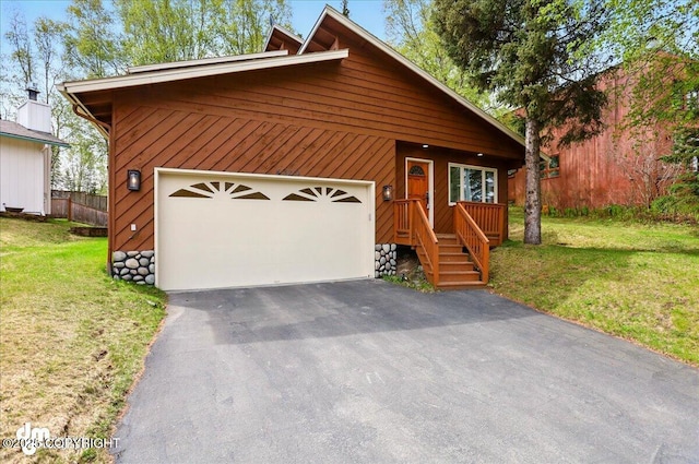 4320 Seeley Cir, Anchorage, AK 99502 - view of front of home featuring a front yard and asphalt driveway