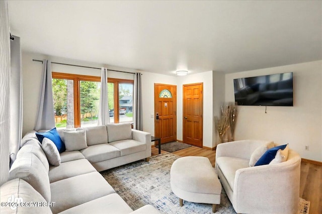 4320 Seeley Cir, Anchorage, AK 99502 - living room featuring wood finished floors and baseboards