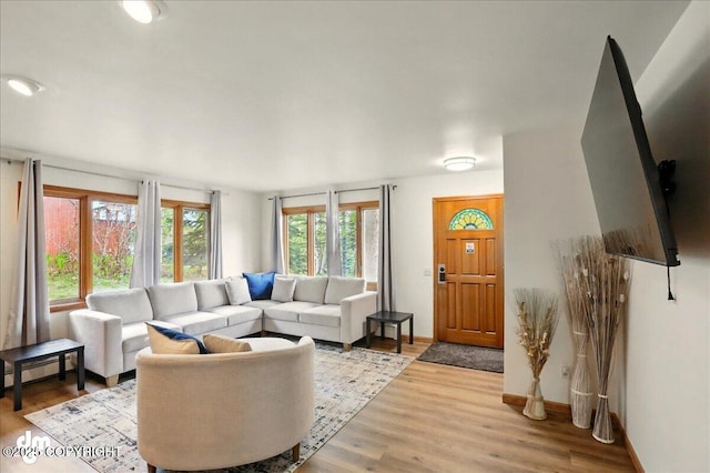 4320 Seeley Cir, Anchorage, AK 99502 - living area featuring wood finished floors and baseboards