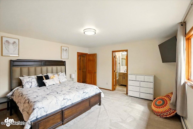 4320 Seeley Cir, Anchorage, AK 99502 - bedroom with light carpet, baseboards, and connected bathroom