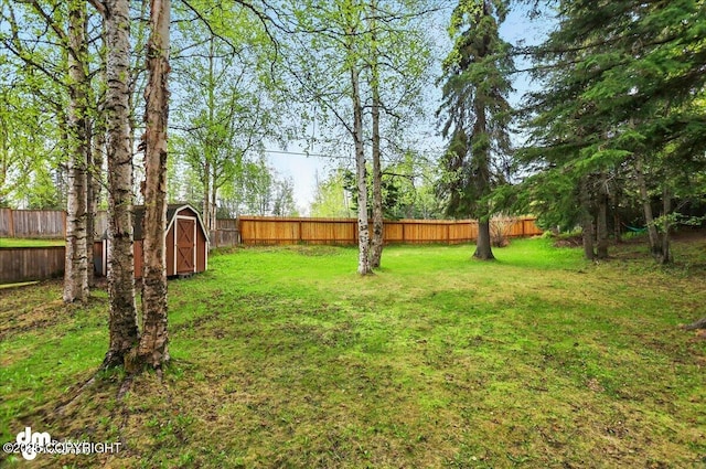4320 Seeley Cir, Anchorage, AK 99502 - view of yard featuring a storage shed and an outbuilding