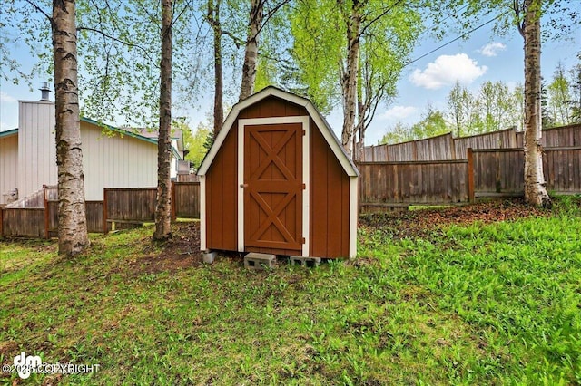 4320 Seeley Cir, Anchorage, AK 99502 - view of shed with a fenced backyard