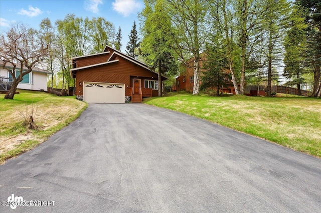 4320 Seeley Cir, Anchorage, AK 99502 - view of front facade with driveway and a garage