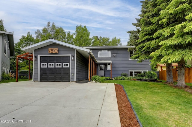 7810 Mae Rene Cir, Anchorage, AK 99502 - view of front of home featuring a garage and concrete driveway
