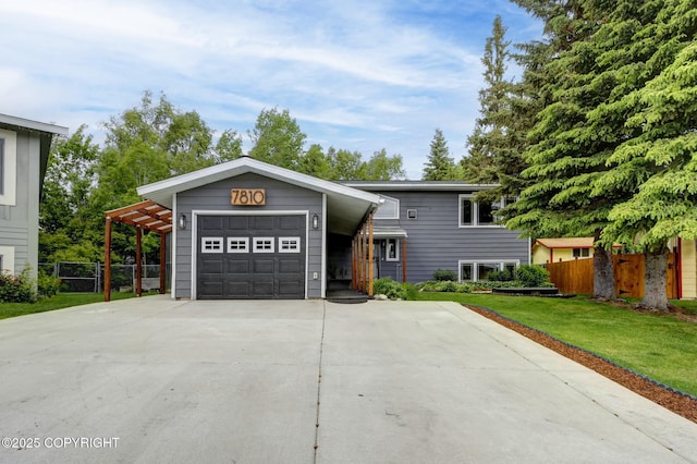 7810 Mae Rene Cir, Anchorage, AK 99502 - view of front of home featuring driveway and an attached garage