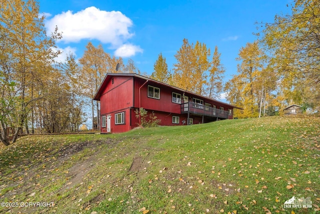 1507 W 47th Ave, Anchorage, AK 99503 - view of home's exterior with a lawn and a wooden deck