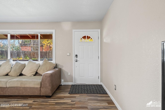 1507 W 47th Ave, Anchorage, AK 99503 - entrance foyer with wood finished floors and baseboards