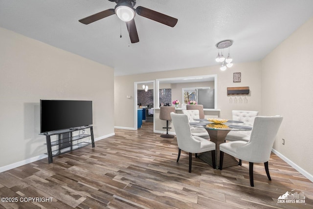 1507 W 47th Ave, Anchorage, AK 99503 - dining room featuring wood finished floors and a ceiling fan