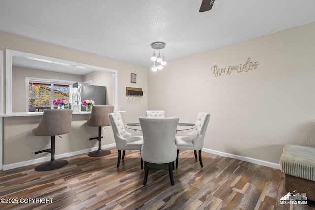1507 W 47th Ave, Anchorage, AK 99503 - dining area with wood finished floors and baseboards