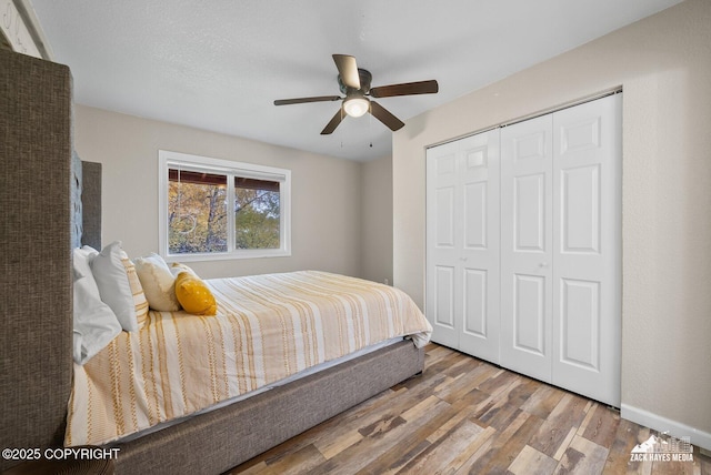1507 W 47th Ave, Anchorage, AK 99503 - bedroom featuring wood finished floors, a closet, and ceiling fan