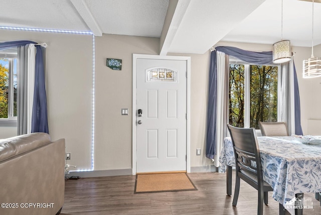 1507 W 47th Ave, Anchorage, AK 99503 - entryway featuring wood finished floors and baseboards