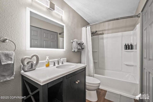 1507 W 47th Ave, Anchorage, AK 99503 - bathroom with a textured wall, shower / tub combo with curtain, vanity, and wood finished floors