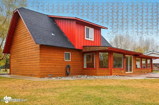 view of home's exterior featuring board and batten siding, roof with shingles, and a lawn