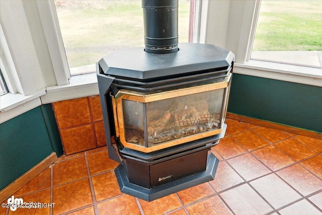 detailed view of a wood stove and baseboards
