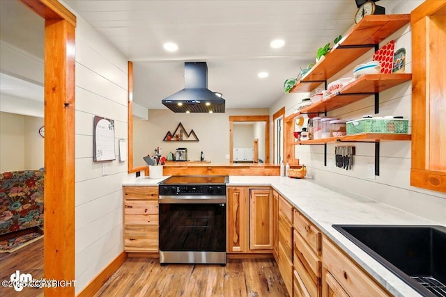 kitchen with exhaust hood, open shelves, light wood-type flooring, electric range, and recessed lighting