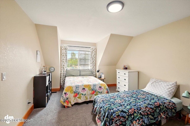 bedroom featuring carpet flooring and baseboards