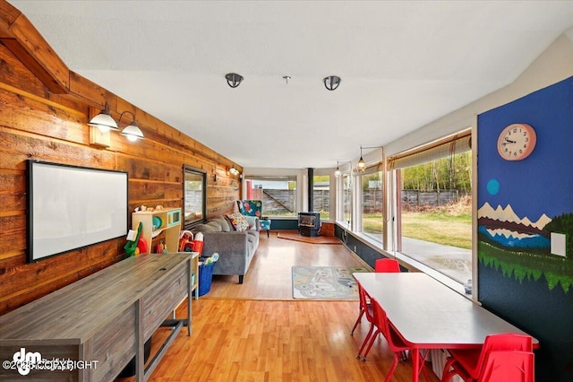sunroom with a wood stove