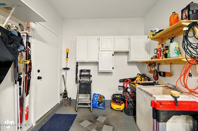 garage with a workshop area