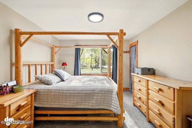 bedroom featuring light colored carpet
