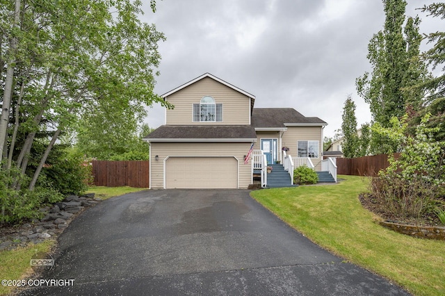 16422 Ondola Cir, Eagle River, AK 99577 - view of front of property featuring an attached garage, asphalt driveway, and a shingled roof