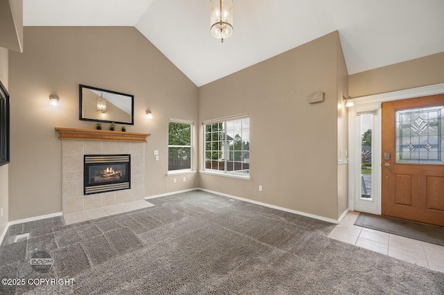 16422 Ondola Cir, Eagle River, AK 99577 - foyer featuring a fireplace, carpet, and high vaulted ceiling