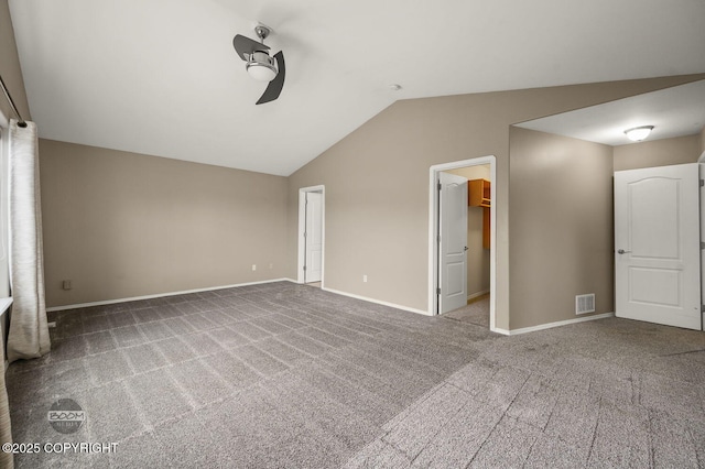 16422 Ondola Cir, Eagle River, AK 99577 - unfurnished room featuring a ceiling fan, vaulted ceiling, and carpet