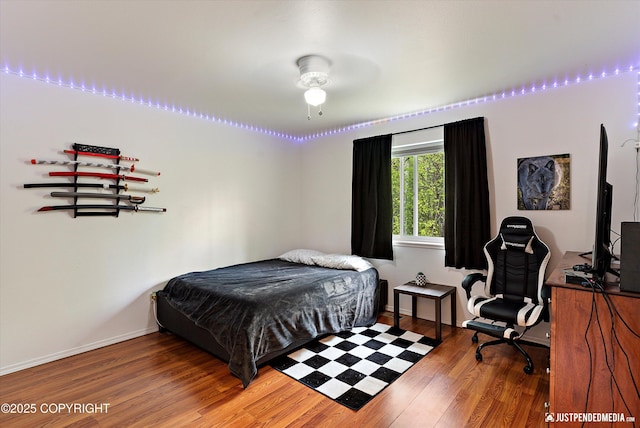2435 N Ravens Flight Dr, Wasilla, AK 99654 - bedroom with wood finished floors and baseboards
