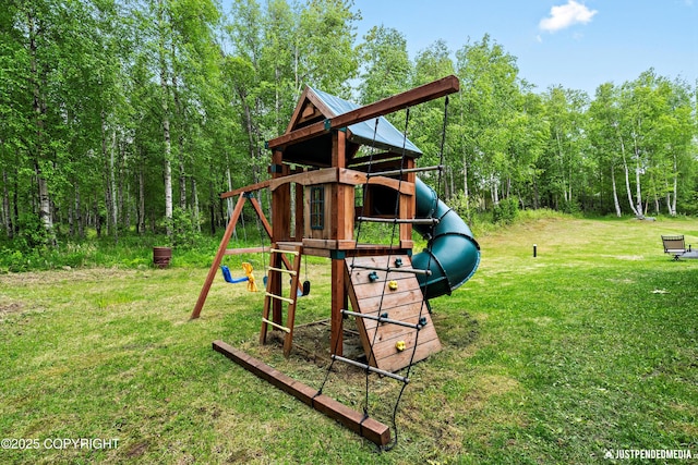 2435 N Ravens Flight Dr, Wasilla, AK 99654 - view of playground featuring a yard and a view of trees