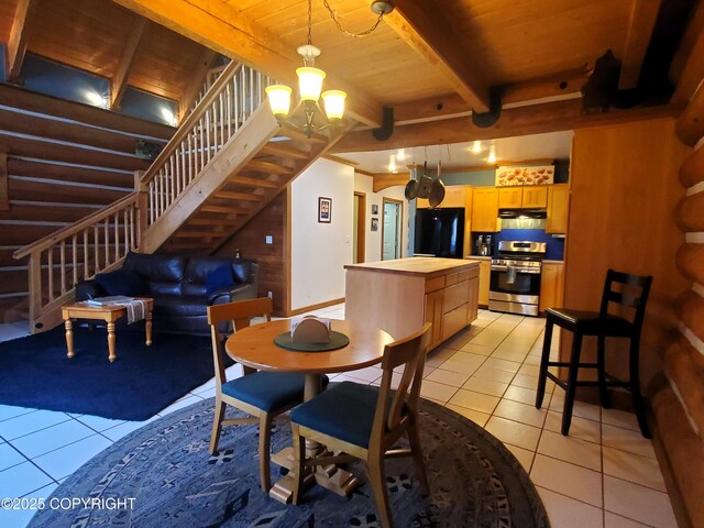dining area with light tile patterned flooring, stairs, a chandelier, wooden ceiling, and beamed ceiling