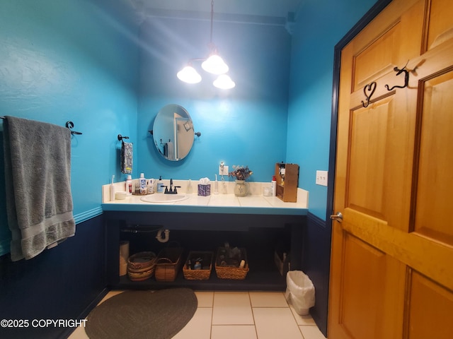 bathroom featuring vanity and tile patterned flooring