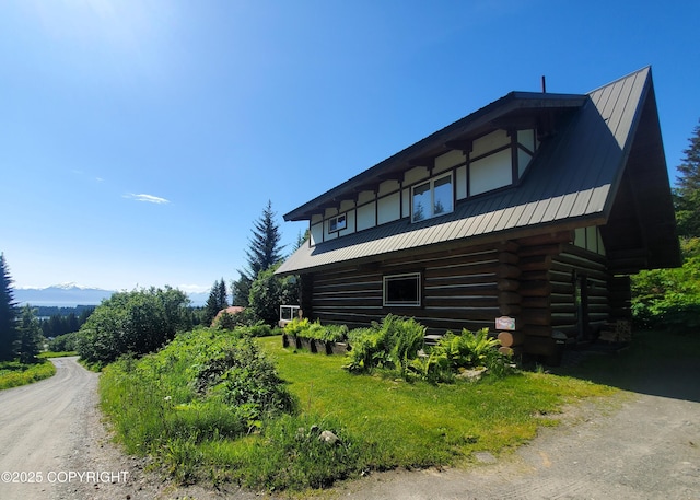 4510 Thomas Ct, Homer, AK 99603 - view of property exterior featuring log siding and a metal roof