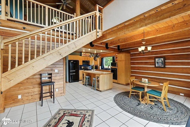 4510 Thomas Ct, Homer, AK 99603 - dining space with a chandelier, stairs, light tile patterned floors, a wooden ceiling with exposed beams, and ceiling fan