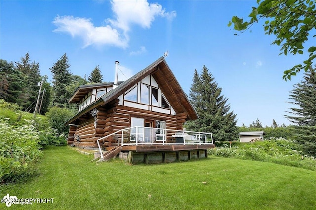 4510 Thomas Ct, Homer, AK 99603 - back of property with log exterior, a yard, and a deck