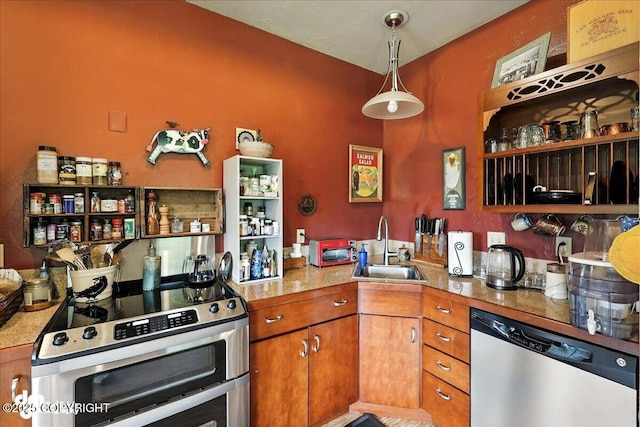 4510 Thomas Ct, Homer, AK 99603 - kitchen featuring appliances with stainless steel finishes, open shelves, brown cabinetry, hanging light fixtures, and tile counters